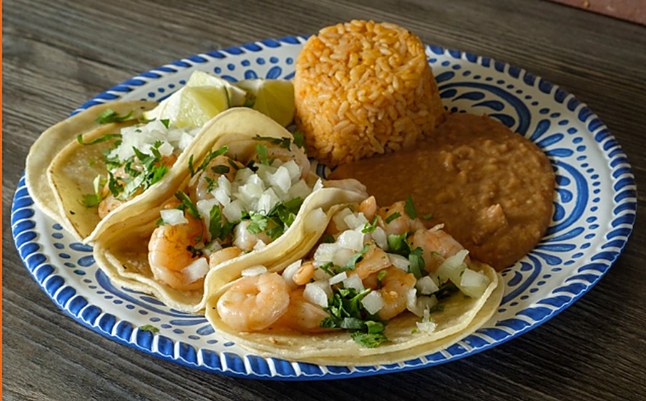 Shrimp tacos with rice and beans