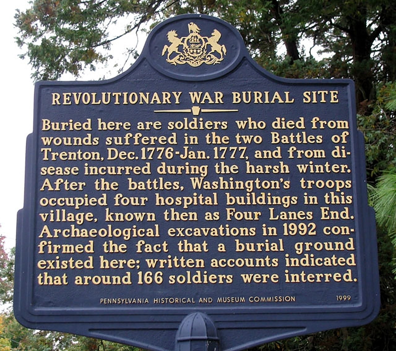 Blue and gold Pennsylvania state historical marker reading Revolutionary War Burial Site
